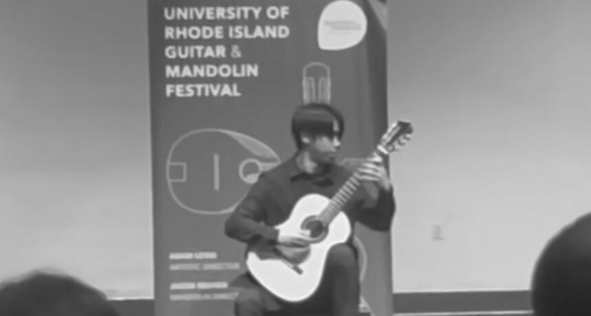 Jiujiu Wu performing classical guitar at the Rhode Island University Guitar and Mandolin Festival Competition