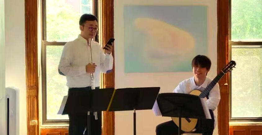Jiujiu Wu with Zuoliang Liu Playing Guitar and Flute Concert at Fou Gallery