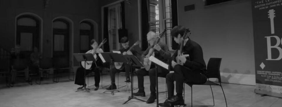 Jiujiu Wu with the New England Conservatory Guitar Ensemble performing a classical guitar quartet at the Boston Guitar Fest 2024 Closing Ceremony with