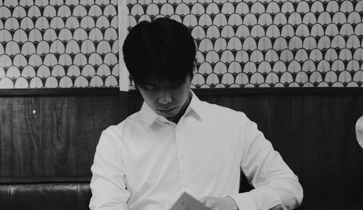 Jiujiu Wu performing classical guitar at the Rhode Island University Guitar and Mandolin Festival Competition